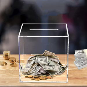 Un frasco de ahorro único transparente Piggy Bank Money Saving Coin Box
